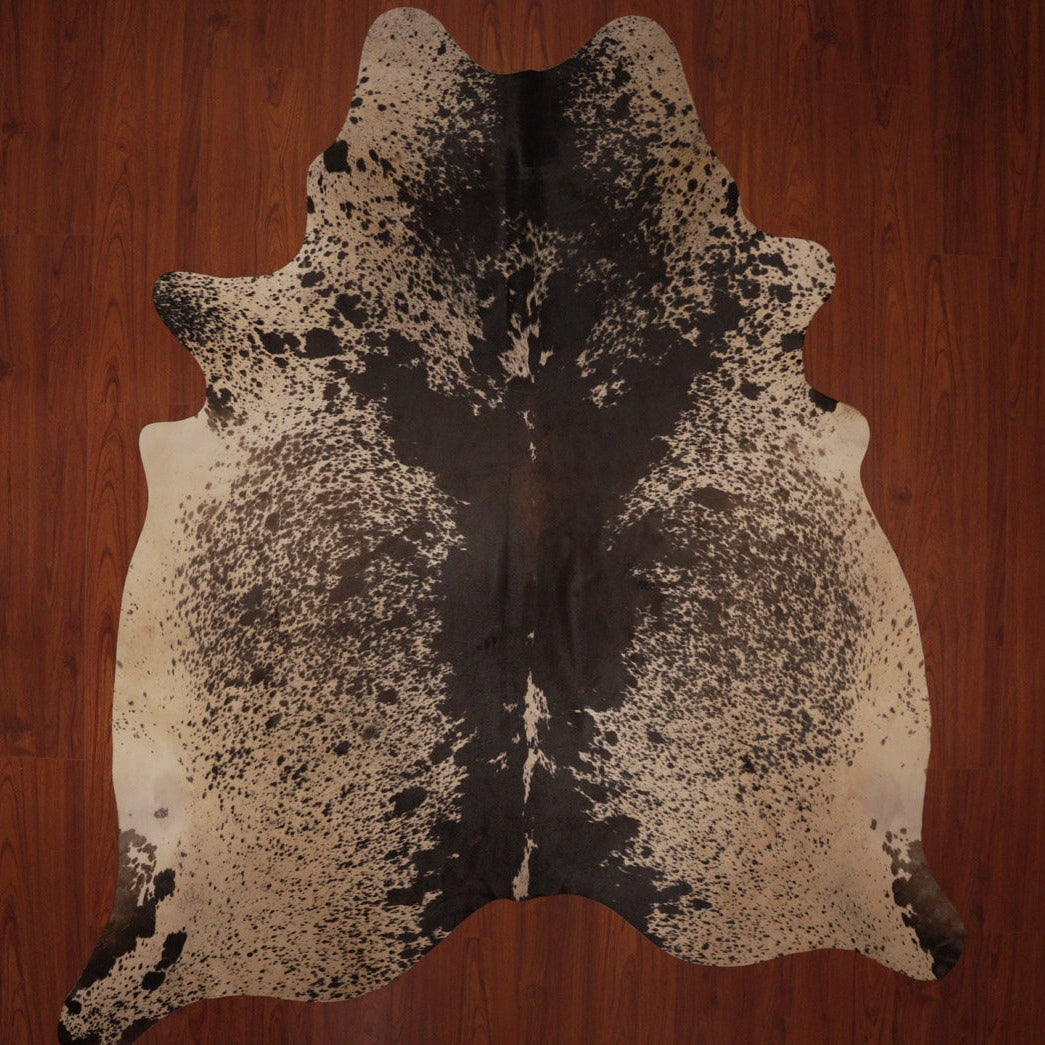 The Nguni Guy Nguni cowhide African decor Authentic cowhide Home decor Interior design Unique pattern Hand-selected Premium quality Natural beauty Exotic rug Genuine hide Statement piece Contemporary style Ethically sourced Sustainable decor Versatile accent Luxury rug Designer piece Modern aesthetic High-end craftsmanship Timeless elegance Designer home accents