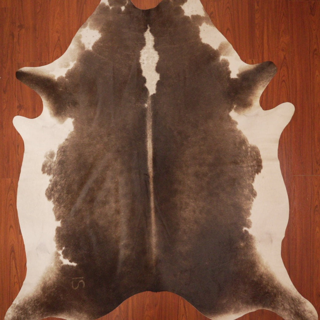 The Nguni Guy Nguni cowhide African decor Authentic cowhide Home decor Interior design Unique pattern Hand-selected Premium quality Natural beauty Exotic rug Genuine hide Statement piece Contemporary style Ethically sourced Sustainable decor Versatile accent Luxury rug Designer piece Modern aesthetic High-end craftsmanship Timeless elegance Designer home accents