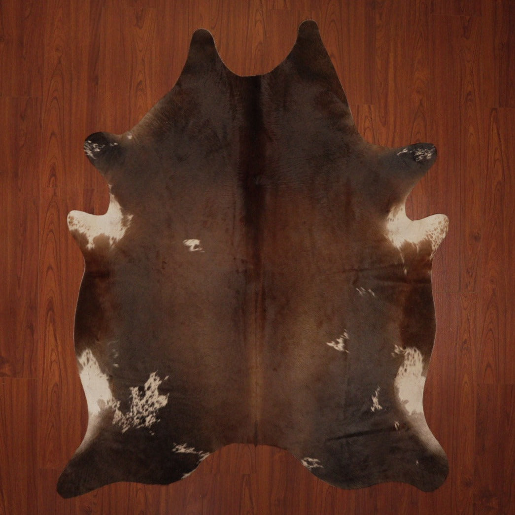 The Nguni Guy Nguni cowhide African decor Authentic cowhide Home decor Interior design Unique pattern Hand-selected Premium quality Natural beauty Exotic rug Genuine hide Statement piece Contemporary style Ethically sourced Sustainable decor Versatile accent Luxury rug Designer piece Modern aesthetic High-end craftsmanship Timeless elegance Designer home accents