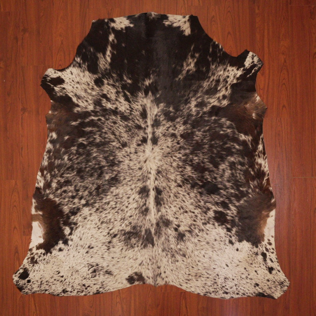 The Nguni Guy Nguni cowhide African decor Authentic cowhide Home decor Interior design Unique pattern Hand-selected Premium quality Natural beauty Exotic rug Genuine hide Statement piece Contemporary style Ethically sourced Sustainable decor Versatile accent Luxury rug Designer piece Modern aesthetic High-end craftsmanship Timeless elegance Designer home accents