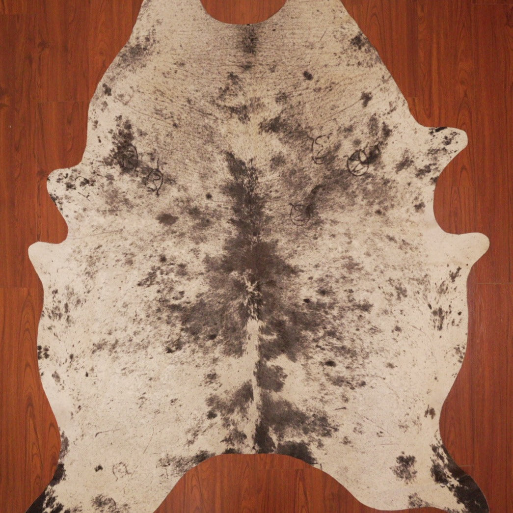 The Nguni Guy Nguni cowhide African decor Authentic cowhide Home decor Interior design Unique pattern Hand-selected Premium quality Natural beauty Exotic rug Genuine hide Statement piece Contemporary style Ethically sourced Sustainable decor Versatile accent Luxury rug Designer piece Modern aesthetic High-end craftsmanship Timeless elegance Designer home accents