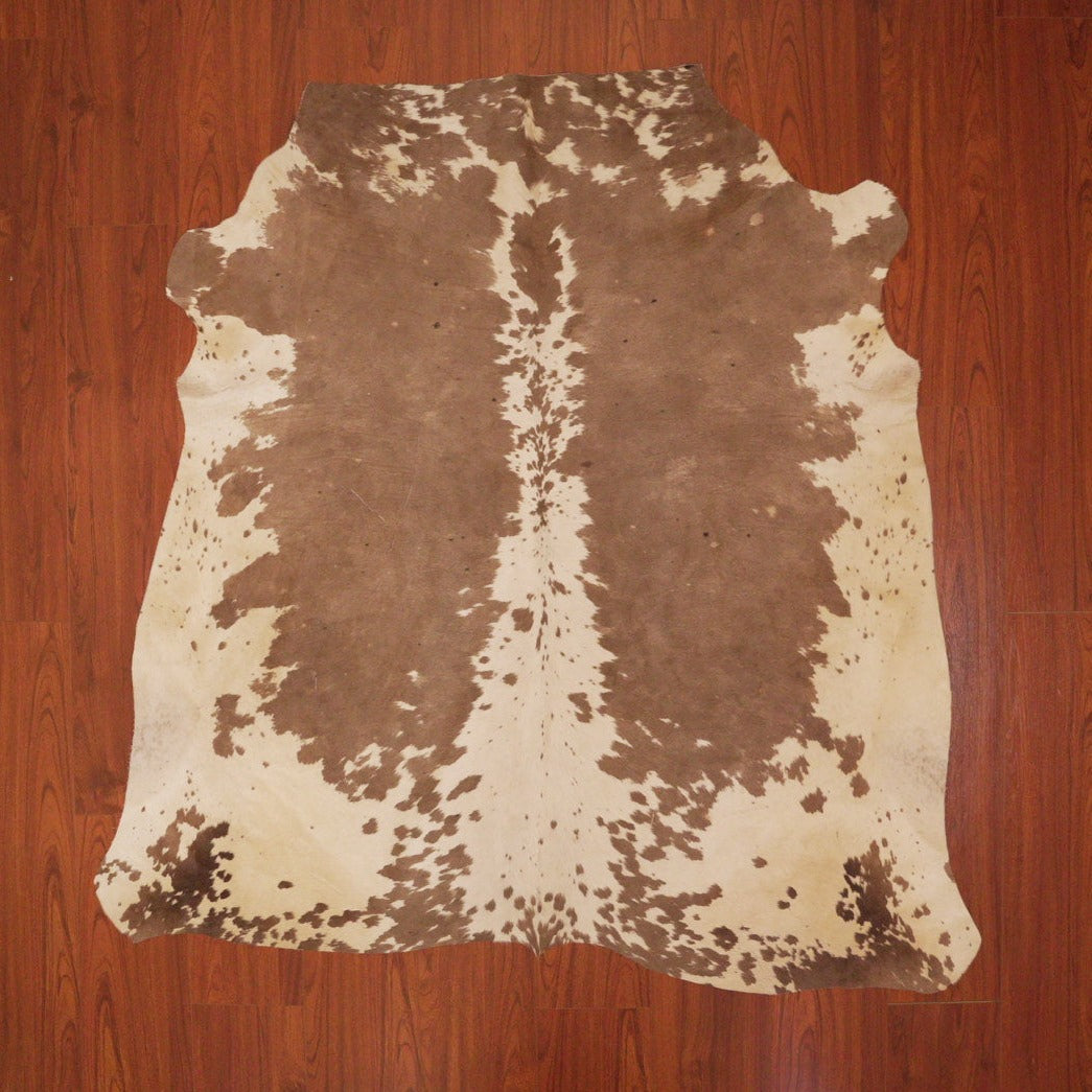 The Nguni Guy Nguni cowhide African decor Authentic cowhide Home decor Interior design Unique pattern Hand-selected Premium quality Natural beauty Exotic rug Genuine hide Statement piece Contemporary style Ethically sourced Sustainable decor Versatile accent Luxury rug Designer piece Modern aesthetic High-end craftsmanship Timeless elegance Designer home accents