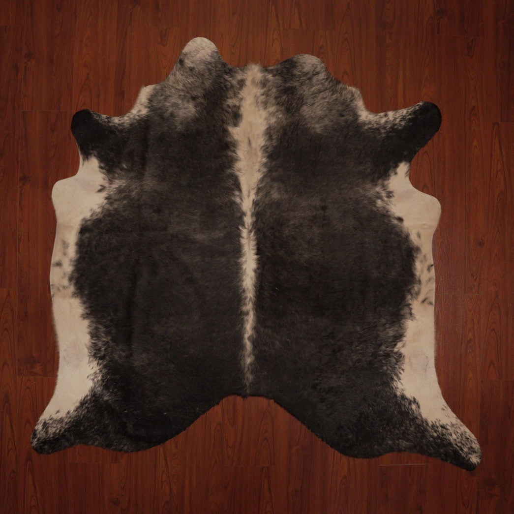 The Nguni Guy Nguni cowhide African decor Authentic cowhide Home decor Interior design Unique pattern Hand-selected Premium quality Natural beauty Exotic rug Genuine hide Statement piece Contemporary style Ethically sourced Sustainable decor Versatile accent Luxury rug Designer piece Modern aesthetic High-end craftsmanship Timeless elegance Designer home accents