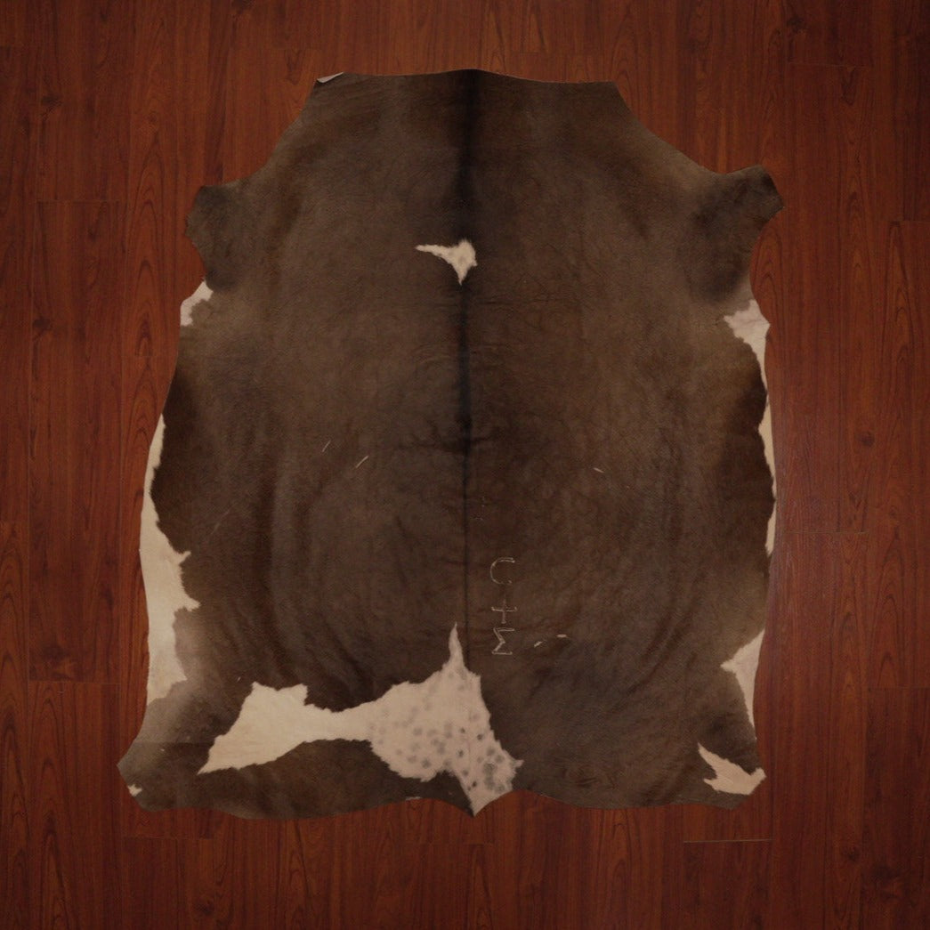 The Nguni Guy Nguni cowhide African decor Authentic cowhide Home decor Interior design Unique pattern Hand-selected Premium quality Natural beauty Exotic rug Genuine hide Statement piece Contemporary style Ethically sourced Sustainable decor Versatile accent Luxury rug Designer piece Modern aesthetic High-end craftsmanship Timeless elegance Designer home accents