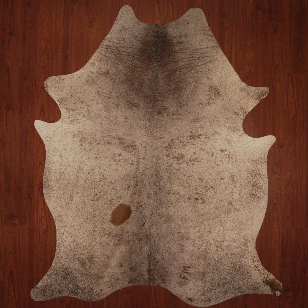 The Nguni Guy Nguni cowhide African decor Authentic cowhide Home decor Interior design Unique pattern Hand-selected Premium quality Natural beauty Exotic rug Genuine hide Statement piece Contemporary style Ethically sourced Sustainable decor Versatile accent Luxury rug Designer piece Modern aesthetic High-end craftsmanship Timeless elegance Designer home accents