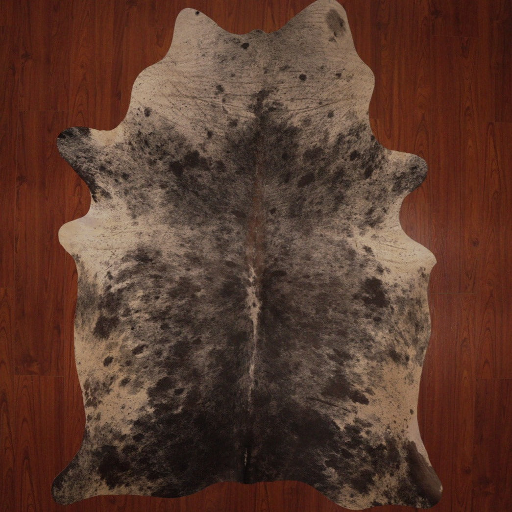 The Nguni Guy Nguni cowhide African decor Authentic cowhide Home decor Interior design Unique pattern Hand-selected Premium quality Natural beauty Exotic rug Genuine hide Statement piece Contemporary style Ethically sourced Sustainable decor Versatile accent Luxury rug Designer piece Modern aesthetic High-end craftsmanship Timeless elegance Designer home accents