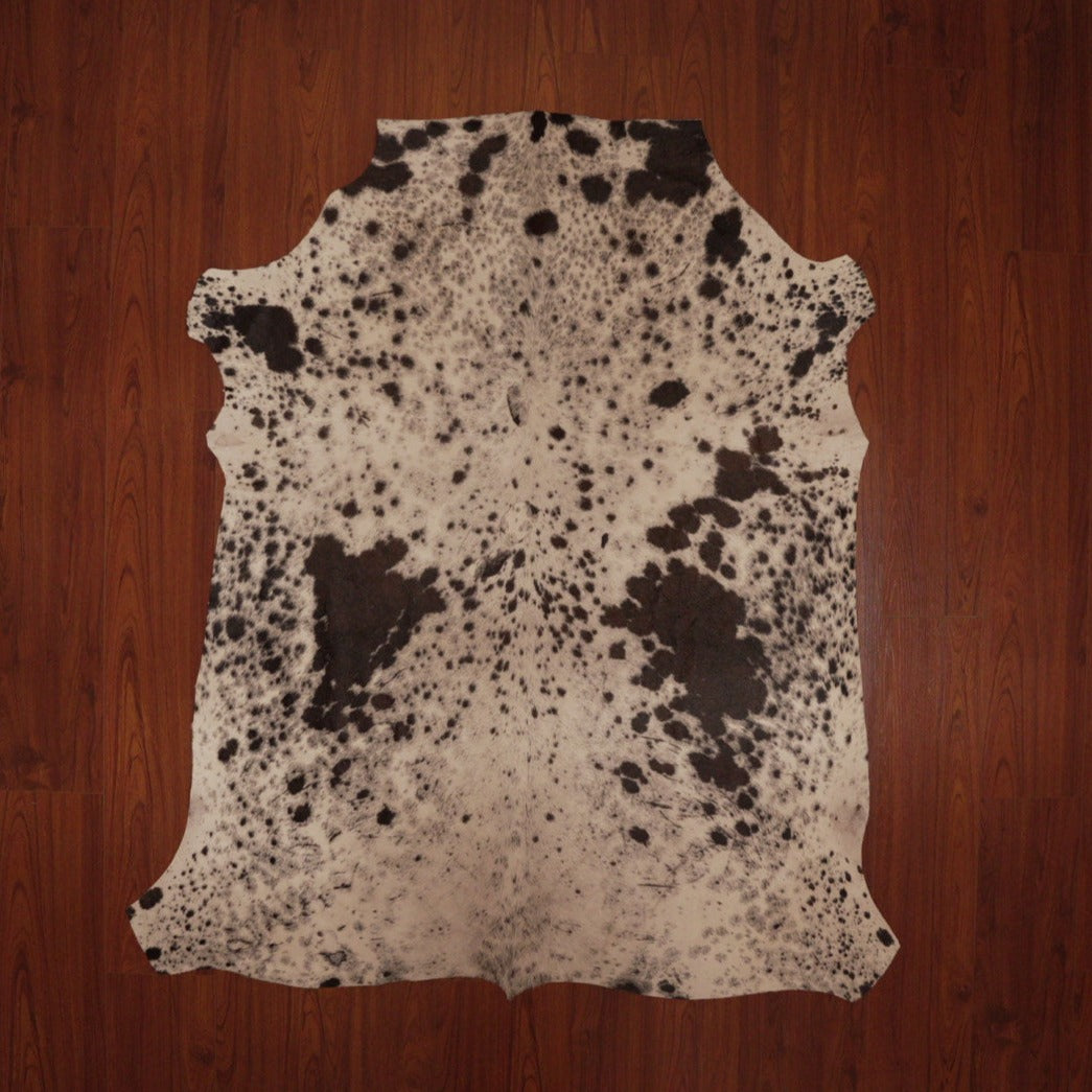 The Nguni Guy Nguni cowhide African decor Authentic cowhide Home decor Interior design Unique pattern Hand-selected Premium quality Natural beauty Exotic rug Genuine hide Statement piece Contemporary style Ethically sourced Sustainable decor Versatile accent Luxury rug Designer piece Modern aesthetic High-end craftsmanship Timeless elegance Designer home accents