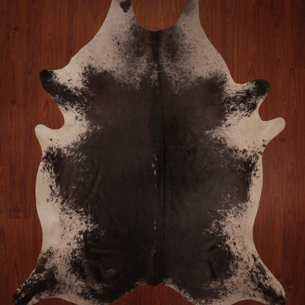 The Nguni Guy Nguni cowhide African decor Authentic cowhide Home decor Interior design Unique pattern Hand-selected Premium quality Natural beauty Exotic rug Genuine hide Statement piece Contemporary style Ethically sourced Sustainable decor Versatile accent Luxury rug Designer piece Modern aesthetic High-end craftsmanship Timeless elegance Designer home accents