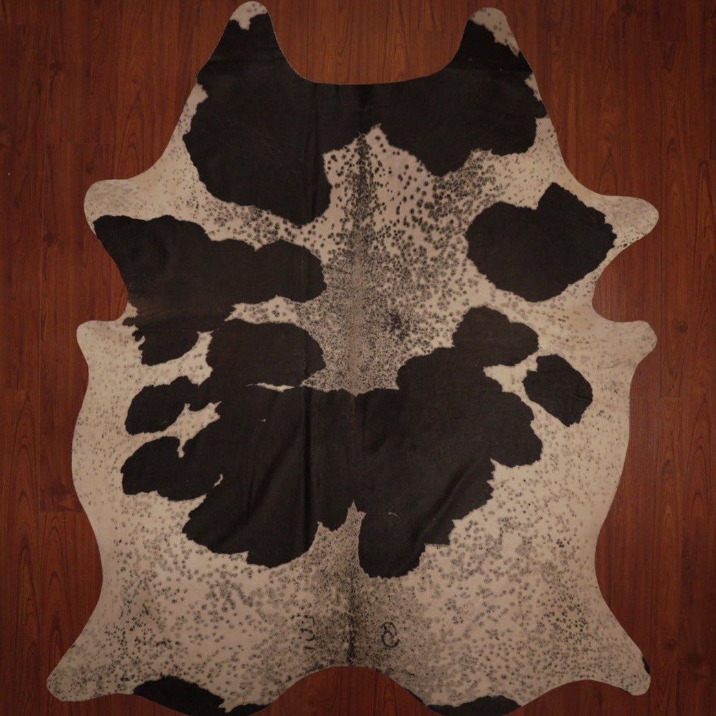 The Nguni Guy Nguni cowhide African decor Authentic cowhide Home decor Interior design Unique pattern Hand-selected Premium quality Natural beauty Exotic rug Genuine hide Statement piece Contemporary style Ethically sourced Sustainable decor Versatile accent Luxury rug Designer piece Modern aesthetic High-end craftsmanship Timeless elegance Designer home accents