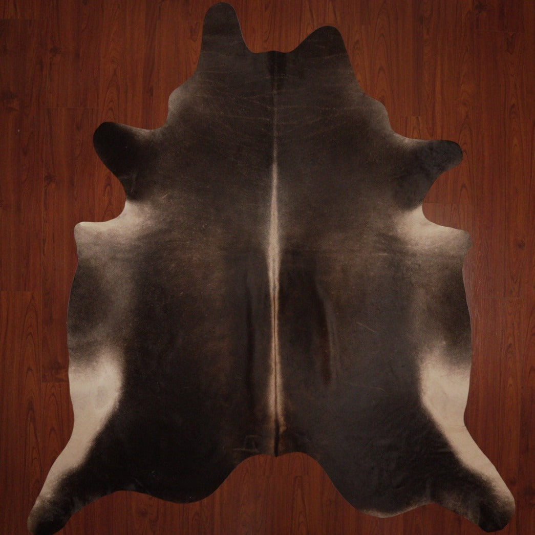 The Nguni Guy Nguni cowhide African decor Authentic cowhide Home decor Interior design Unique pattern Hand-selected Premium quality Natural beauty Exotic rug Genuine hide Statement piece Contemporary style Ethically sourced Sustainable decor Versatile accent Luxury rug Designer piece Modern aesthetic High-end craftsmanship Timeless elegance Designer home accents