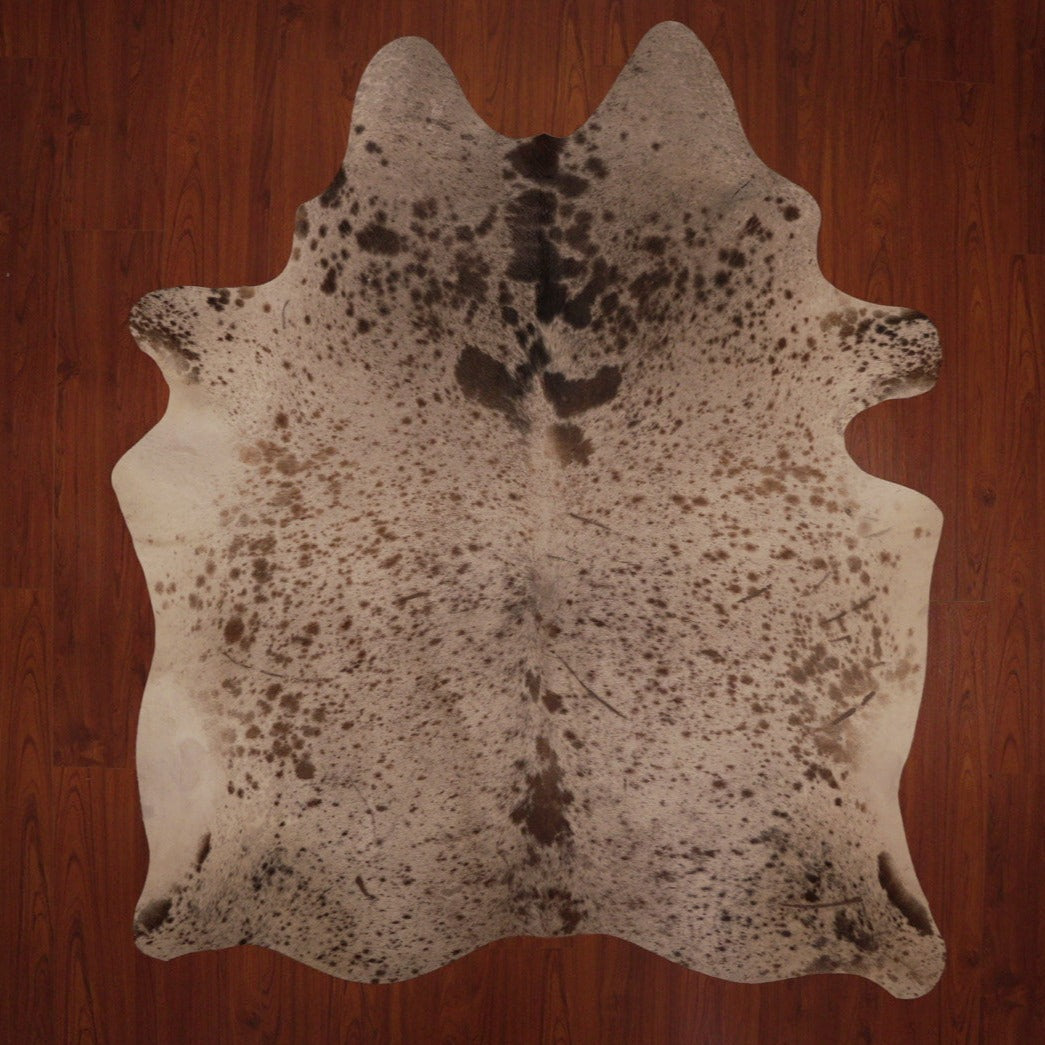 The Nguni Guy Nguni cowhide African decor Authentic cowhide Home decor Interior design Unique pattern Hand-selected Premium quality Natural beauty Exotic rug Genuine hide Statement piece Contemporary style Ethically sourced Sustainable decor Versatile accent Luxury rug Designer piece Modern aesthetic High-end craftsmanship Timeless elegance Designer home accents