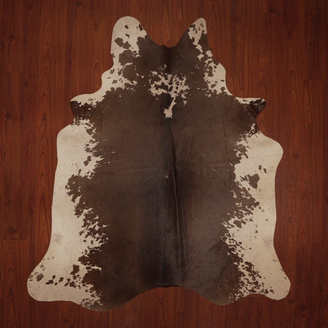 The Nguni Guy Nguni cowhide African decor Authentic cowhide Home decor Interior design Unique pattern Hand-selected Premium quality Natural beauty Exotic rug Genuine hide Statement piece Contemporary style Ethically sourced Sustainable decor Versatile accent Luxury rug Designer piece Modern aesthetic High-end craftsmanship Timeless elegance Designer home accents