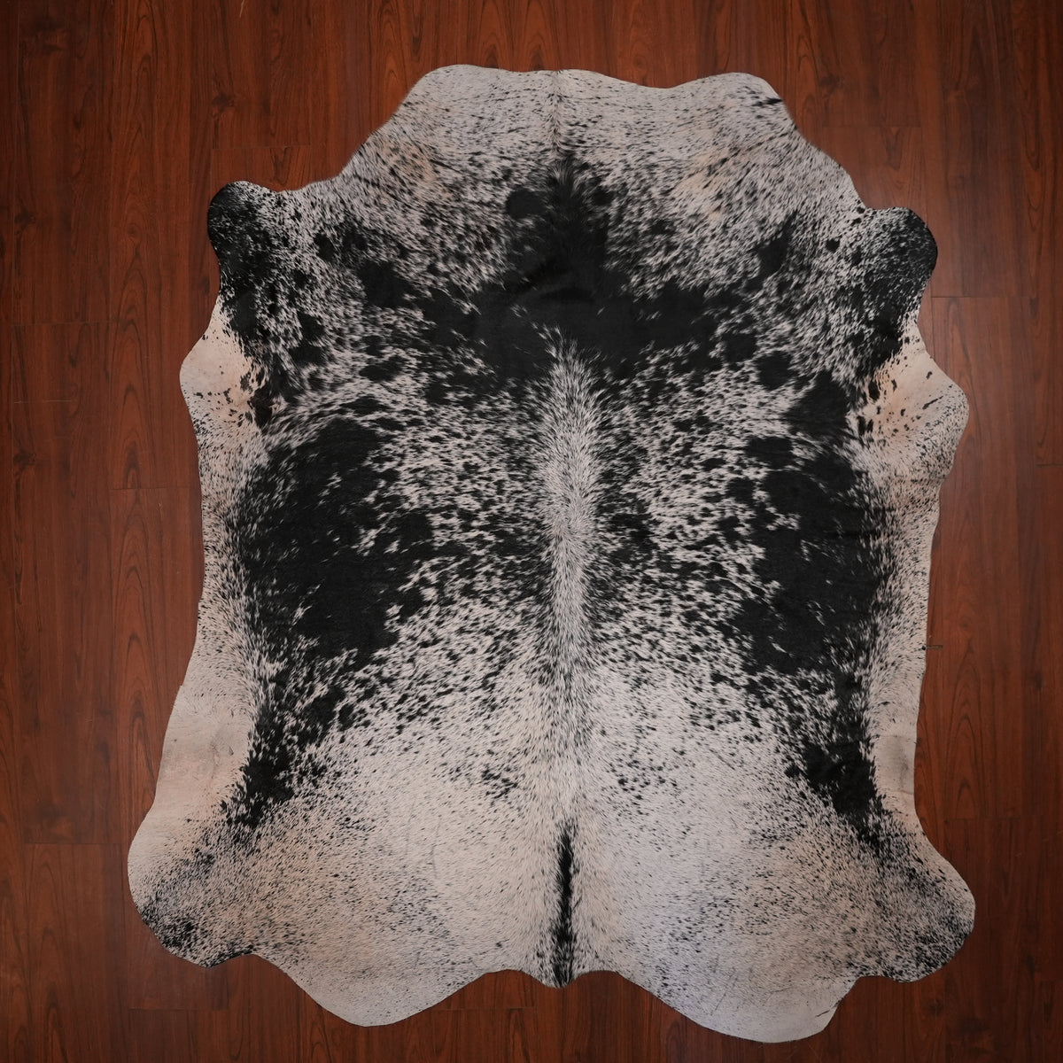 Nguni hide rug in ink-splashed black, 225 x 197 cm, genuine Nguni cow hide